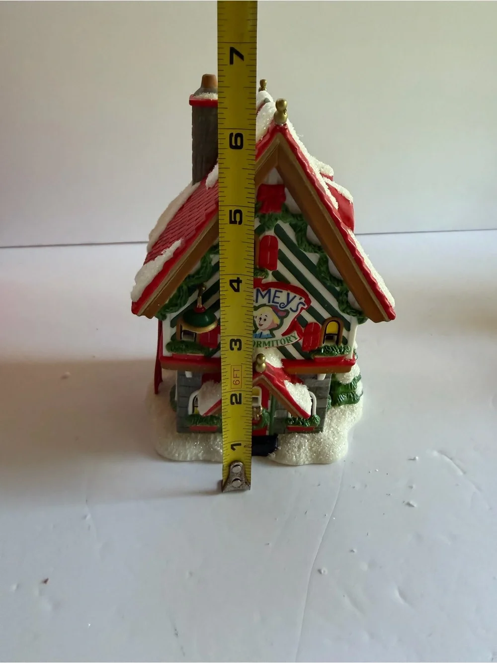 Department 56 Rudolph Hermey's Elf Dormitory - Red, Green, White, Gold